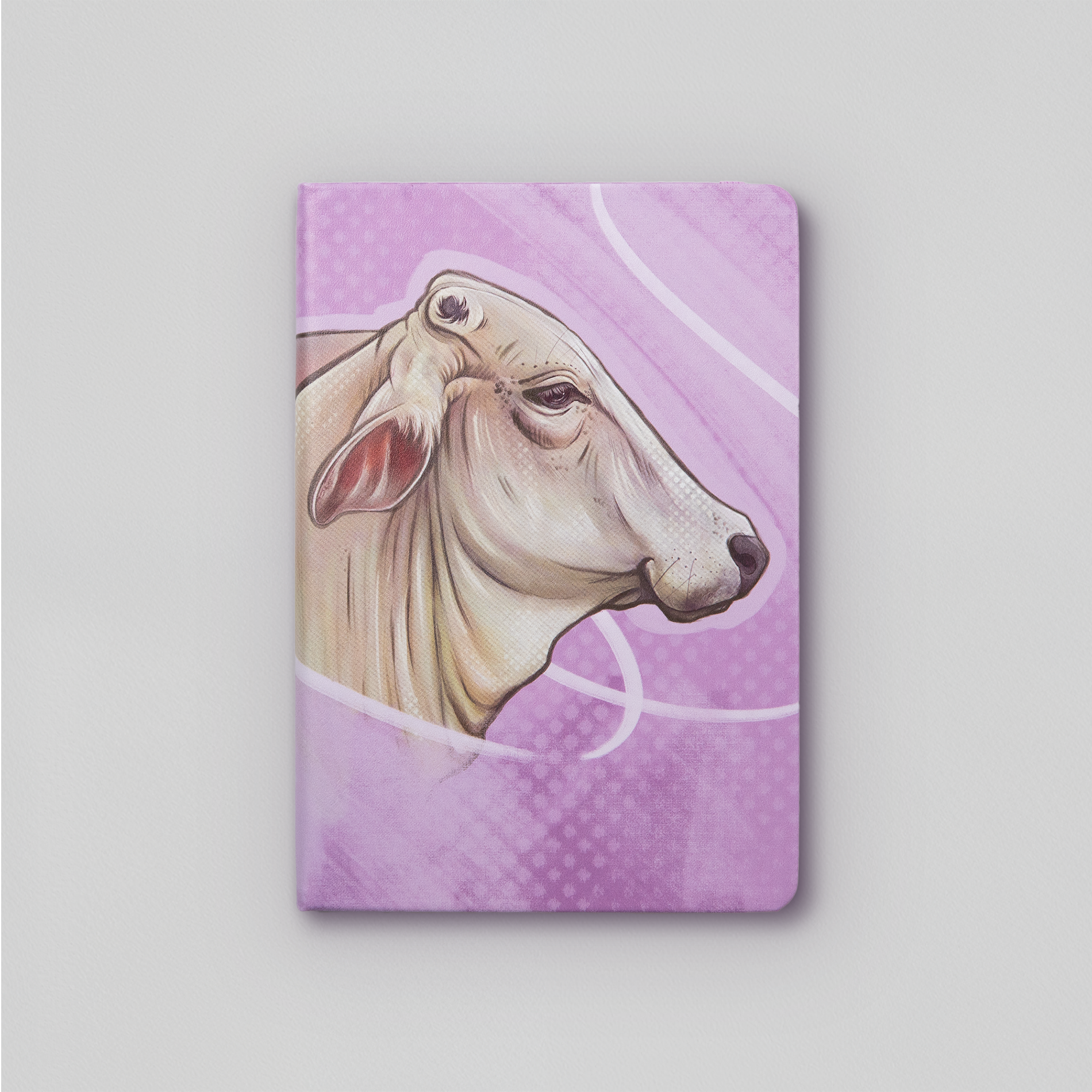 Journel A5 Leatherette purple back ground with Brahman cow head drawn by Tara Leslie, local artist.