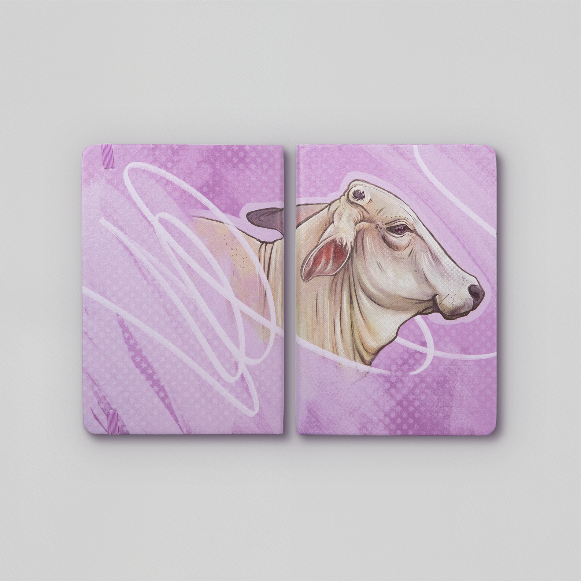 Journel A5 Leatherette purple back ground with Brahman cow head drawn by Tara Leslie, local artist.