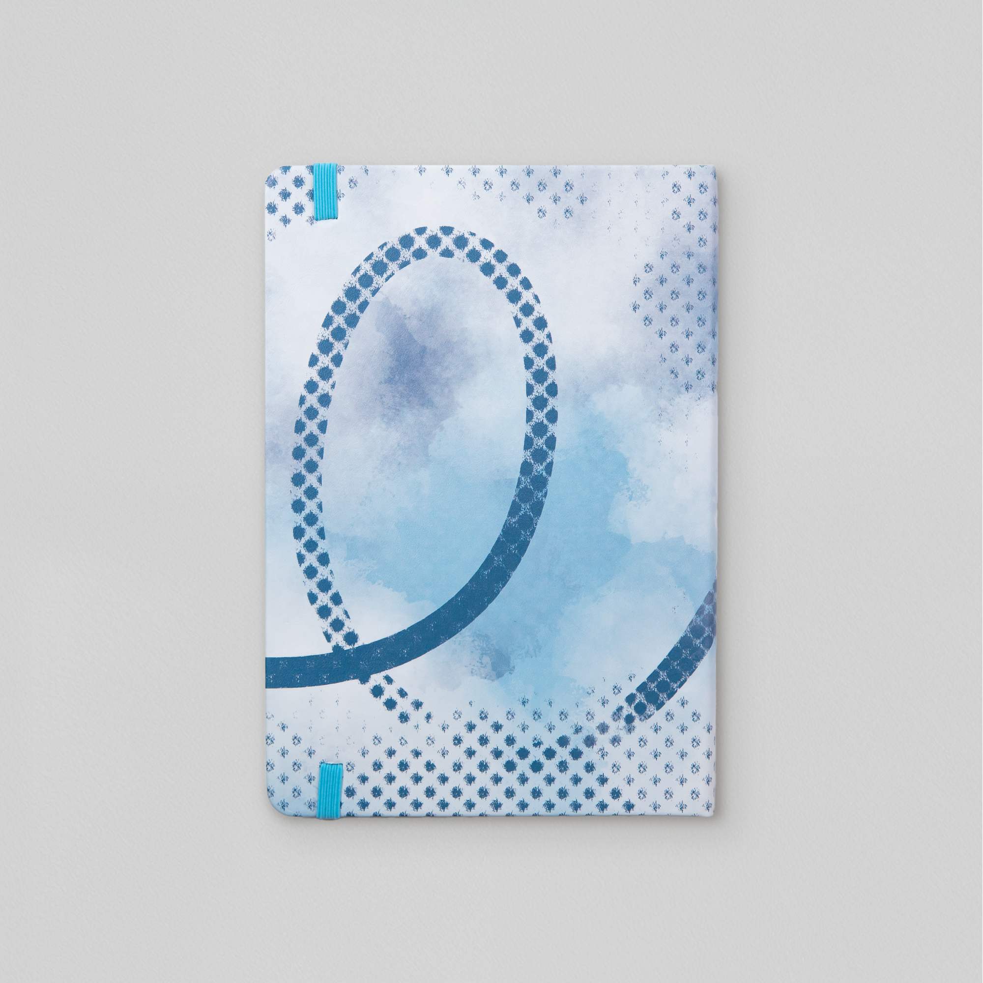 A5 leatherette journal featuring blue background. Artwork by local artist Tara Leslie