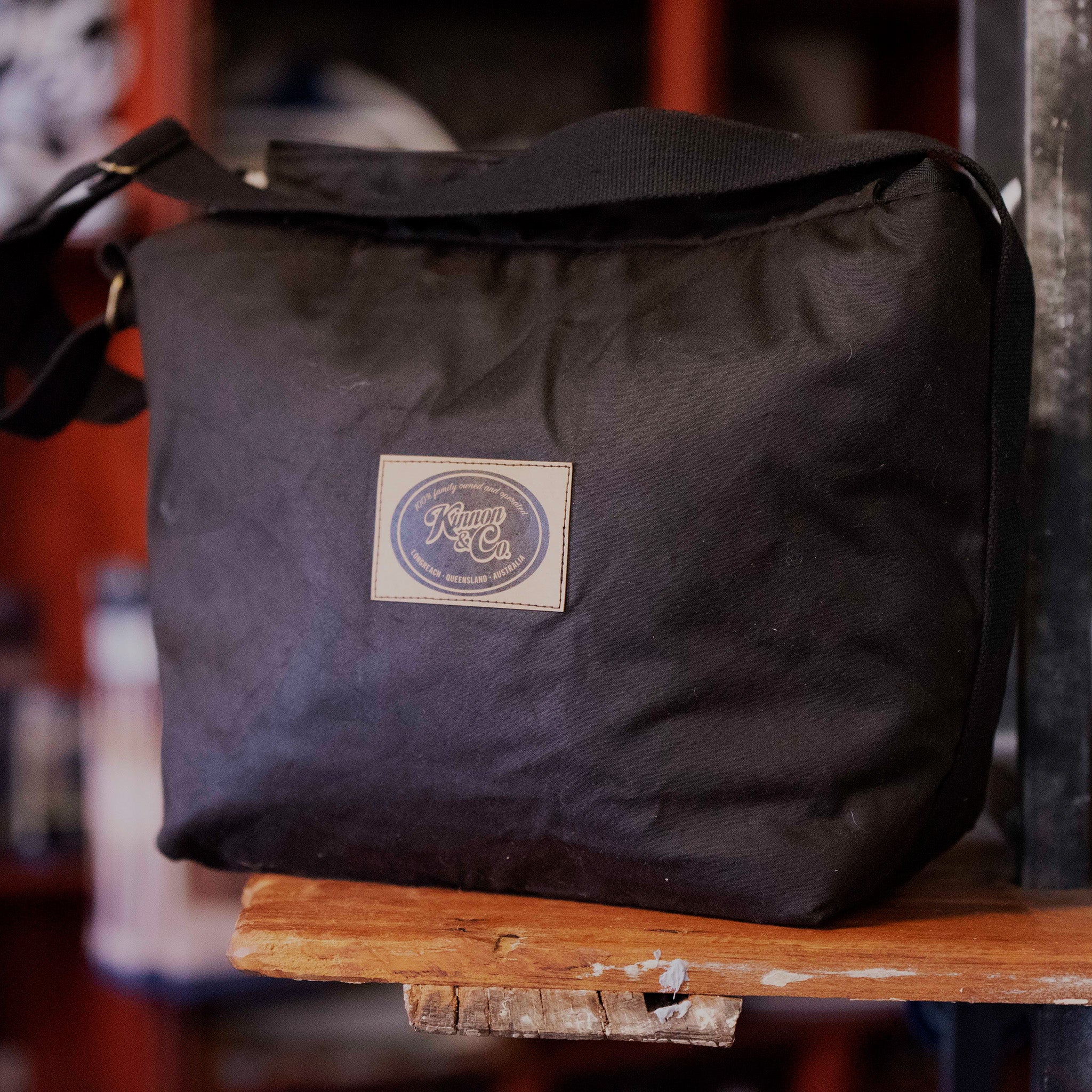 Oilskin Bag with strap branded Kinnon and Co.