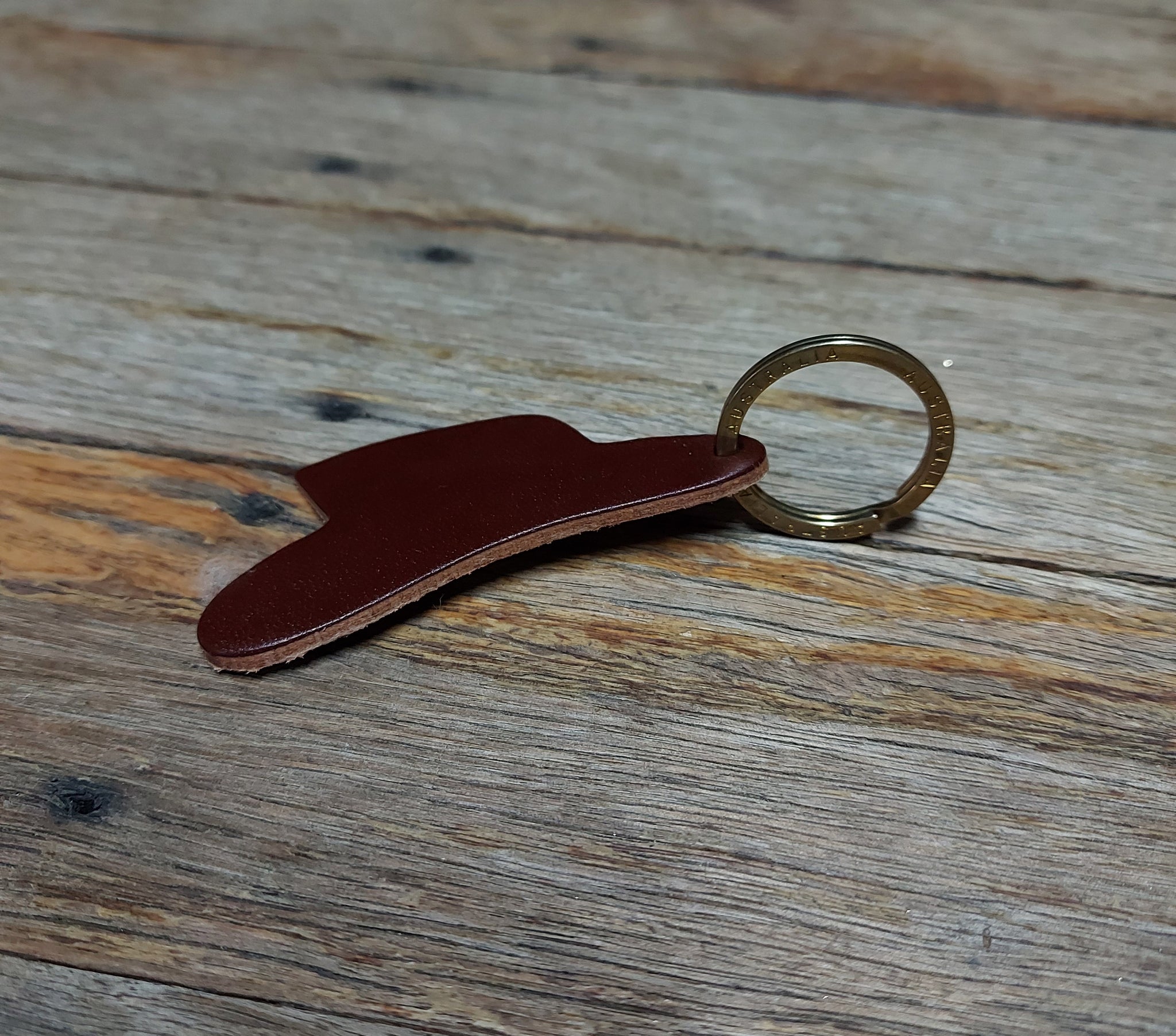 Hat shaped leather keyring.