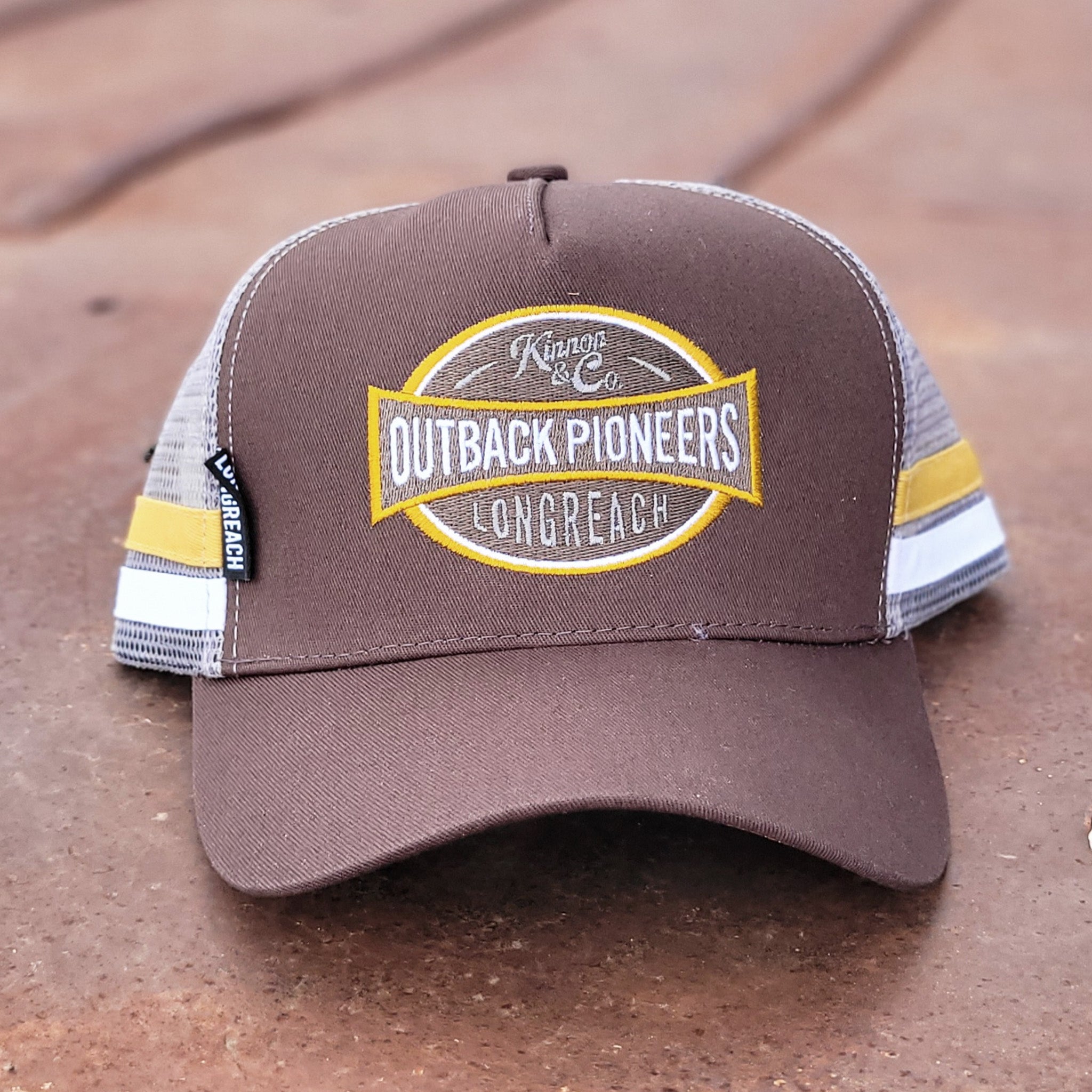 Outback Pioneers country truckers cap brown, yellow and grey.