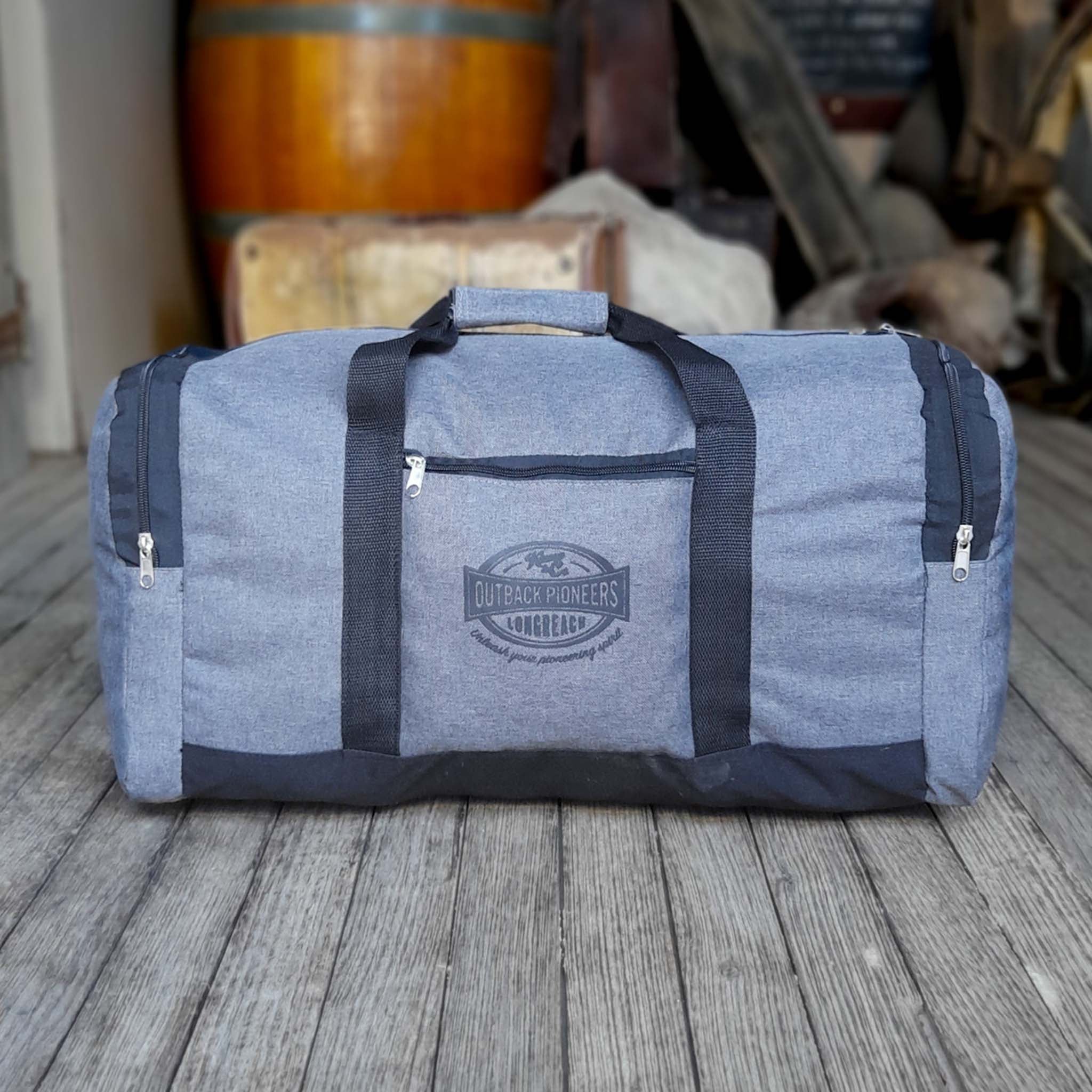 Outback Pioneers branded Black and Grey Duffle Bag. Carry on size. Front