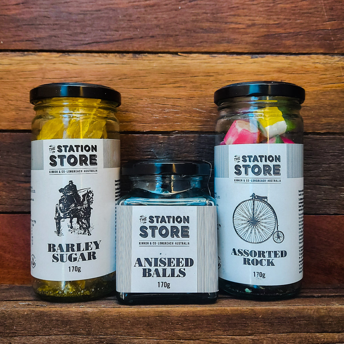 Barley Sugar lollies, Aniseed Balls and Assorted Rock lollies in glass jars.