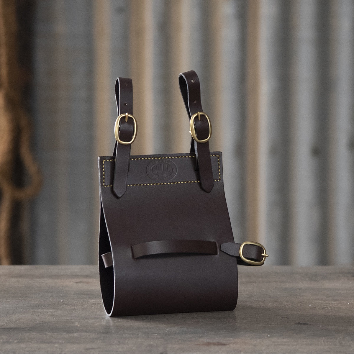 Leather quart pot pouch with straps and brass finishings