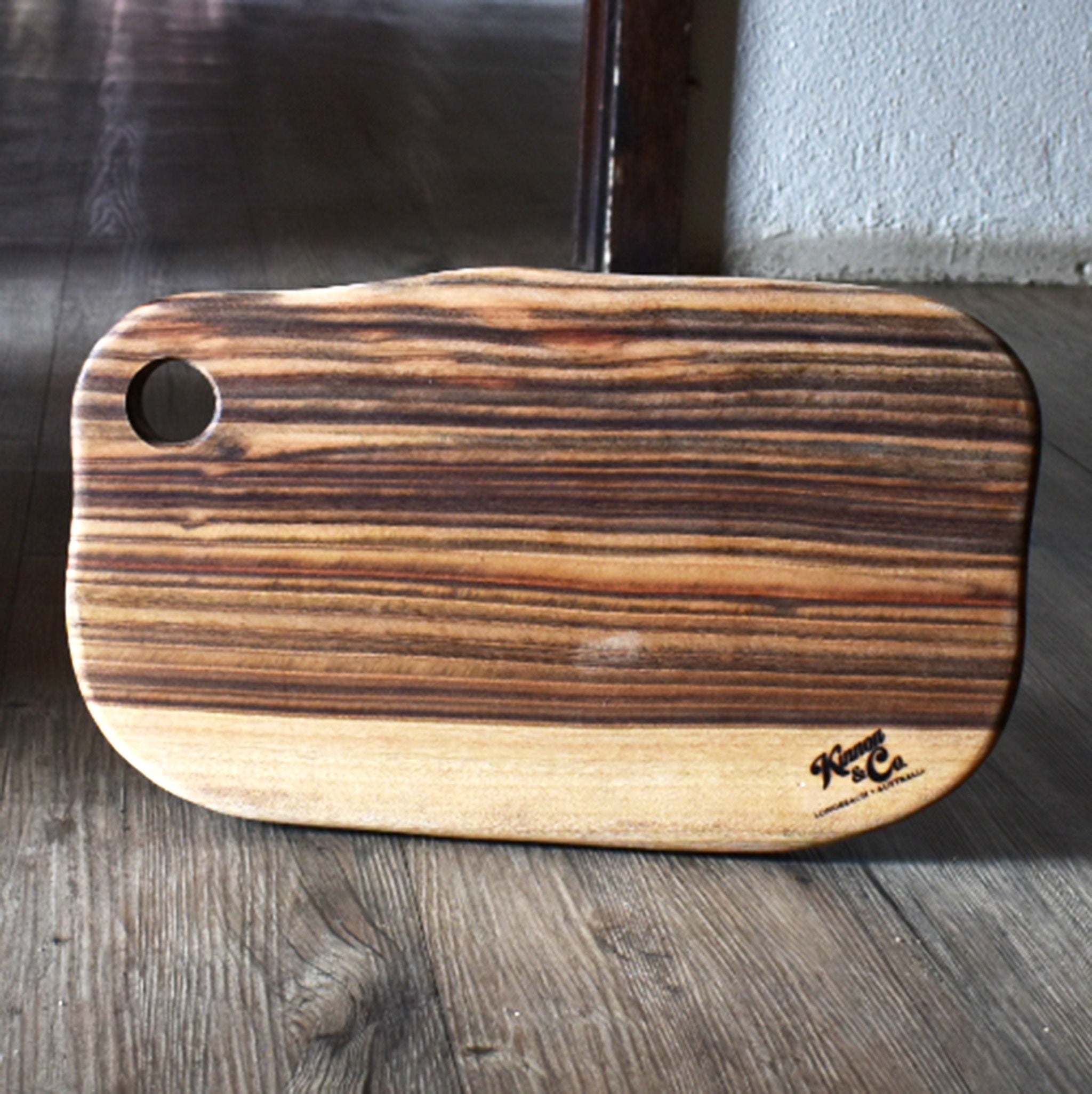 Large timber cutting board with rustic bacground