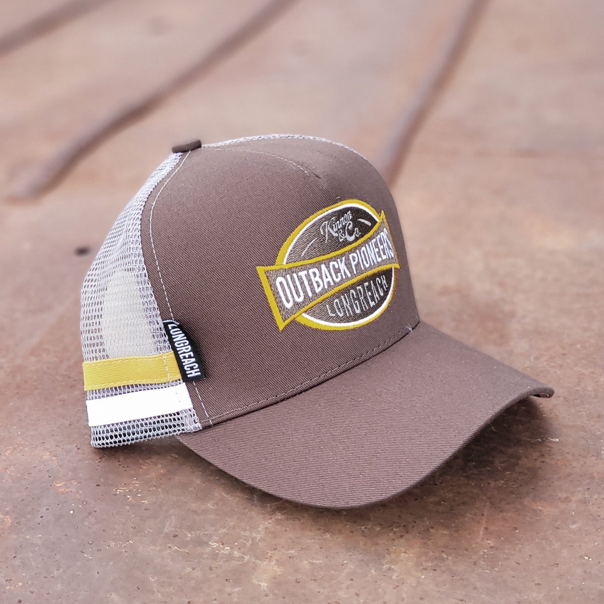 Outback Pioneers country truckers cap brown, yellow and grey. 