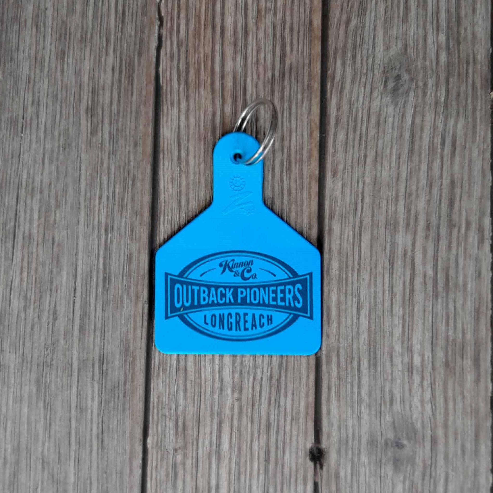 Outback Pioneers branded Cattle Tag Keyring Blue. Back