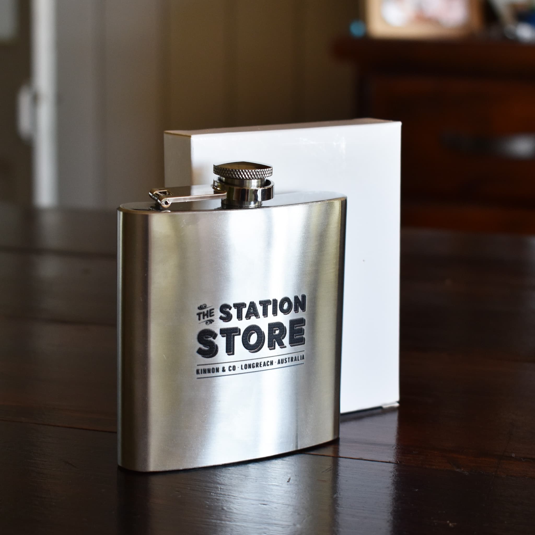 The Station Store, Longreach hip flask with white gift box.