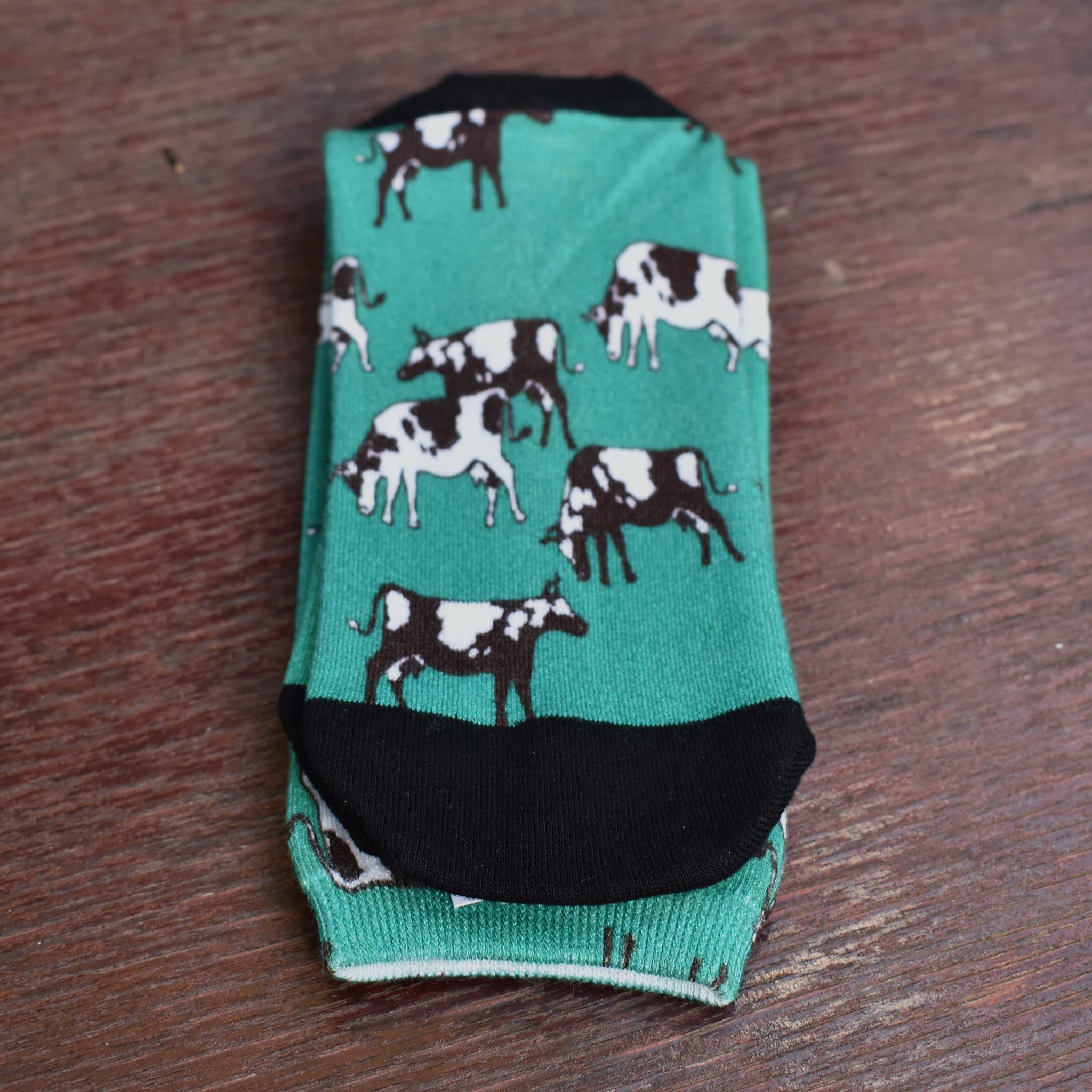 Petterned socks, cows