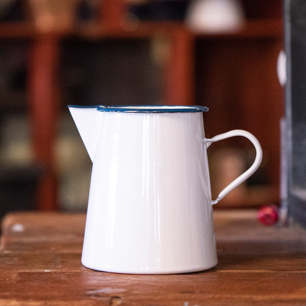 Authentic White enamel pitcher jug with blue trim