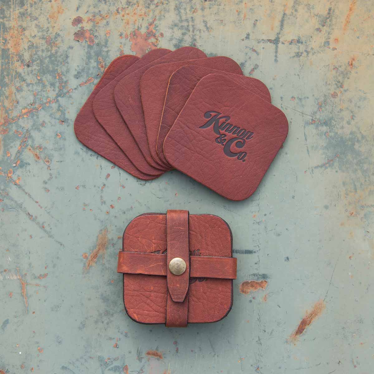 Pack of 6 Kinnon and Co branded leather coasters with strap